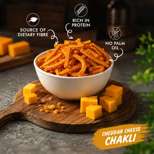Bowl of chakli with cheddar cubes