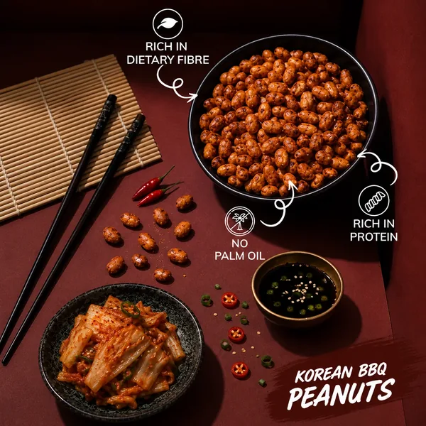 Bowl of peanuts with kimchi and chopsticks
